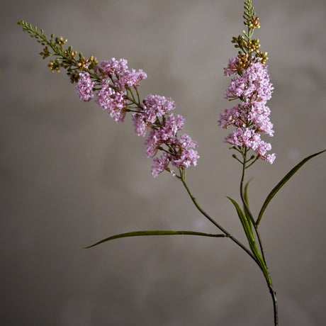 Artificial hydrangea stem, 100cm, with two branching pink floret heads tapering to closed buds, narrow green leaves along the stem, set against a neutral background.