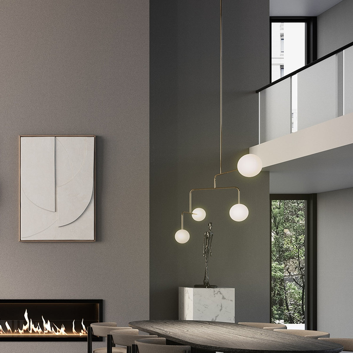 Lumorne 4 Light Glass Globe Chandelier in polished brass, with opal glass globes at staggered heights, shown above a dining table in a modern living space.