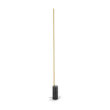 Hilow Line Nero Marquina floor lamp with a slim brushed brass rod rising from a black, white-veined marble cylindrical base, shown on a plain white background.
