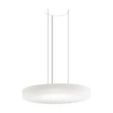 Côte LED pendant light with a broad, shallow frosted white glass disc shade, diagonally ribbed underside, suspended on three thin cables from a round ceiling canopy against a plain white background.