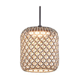 Nans S/16 Outrack pendant light with barrel-shaped woven brown lattice shade, integrated LED glowing warmly, suspended from a black cord on a white background.