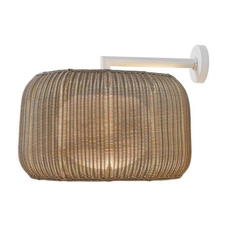 Fora A Drum LED outdoor wall light with a woven light beige drum shade on a white wall-mounted arm, shown on a plain white background.