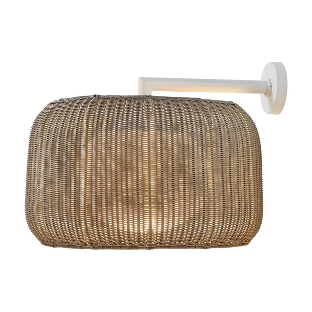 Fora A Drum LED outdoor wall light with a woven light beige drum shade on a white wall-mounted arm, shown on a plain white background.