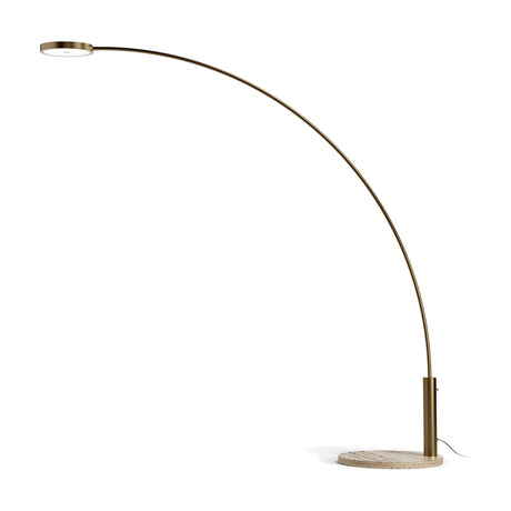 Dip Travertine arc floor lamp with slanted brushed bronze arm, round flat LED disc head, and circular travertine marble base, on a plain white background.