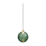 Murané pendant light with a 15cm rippled Forest Green glass sphere, integrated LED, and Brushed Champagne cap on a slim cable against a plain white background.