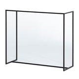 The mirrored glass console table turned slightly to show its depth, the top and side panels carried in a black metal frame.