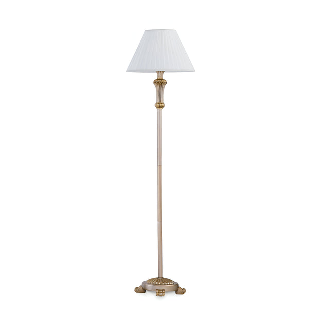 The Firenze Floor Lamp - Gold/White is a tall and elegant decorative lighting piece that features a pleated white lampshade paired with a gold and beige stand. The base is adorned with ornate gold accents and small clawed feet, exuding classic sophistication.