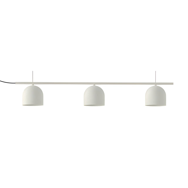 Rio Linear 3 Light Dome Chandelier in matt white, three rounded iron dome shades suspended beneath a long straight bar on thin wires, shown on a plain white background.