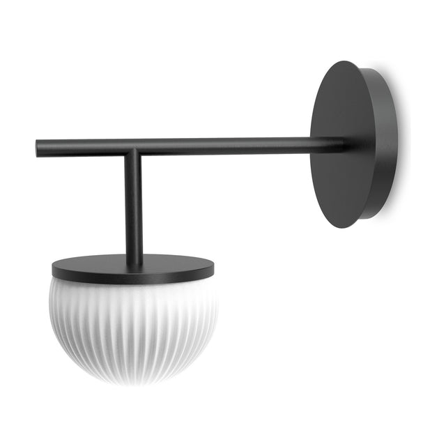 Roi Single Arm Wall Light in black with a round backplate, slim horizontal arm, and ribbed opal white glass dome shade, shown on a plain white background.
