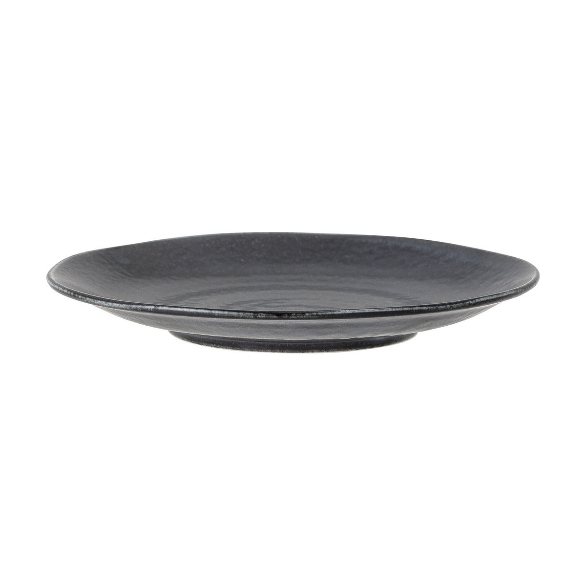 Yoko porcelain side plate in black with a wide shallow rim and speckled, lustrous centre, shown from a side angle on a plain white background.