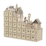 Natural plywood Richie Wooden Advent Calendar with light, 24 numbered knob drawers in stepped tiers beneath a lit village scene with houses, fir trees, and deer, on a white background.