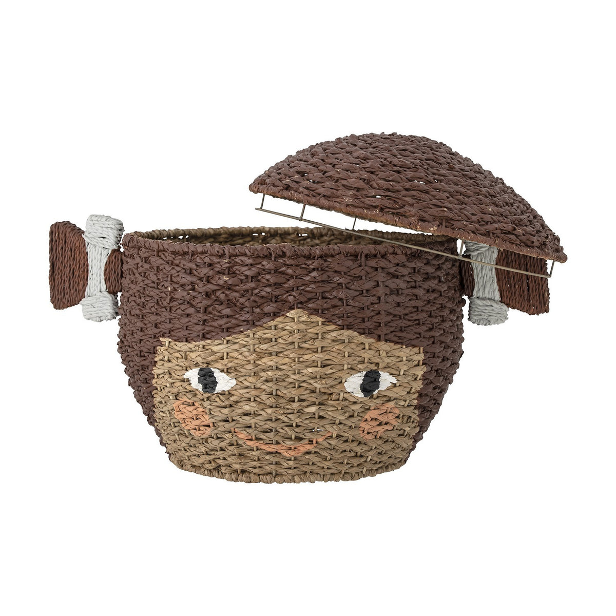 Lill Basket with Lid in Brown, a woven Bankuan grass kids storage basket shaped as a smiling face with two side hair bunches, lid open, on a white background.