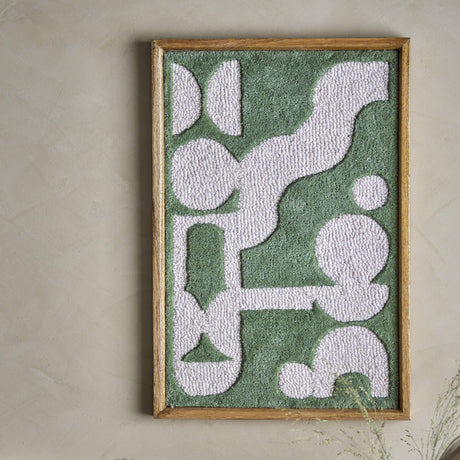 Longton Wool Wall Decor in green, a tufted abstract textile wall art in a slim wooden frame, mounted on a plain neutral wall.