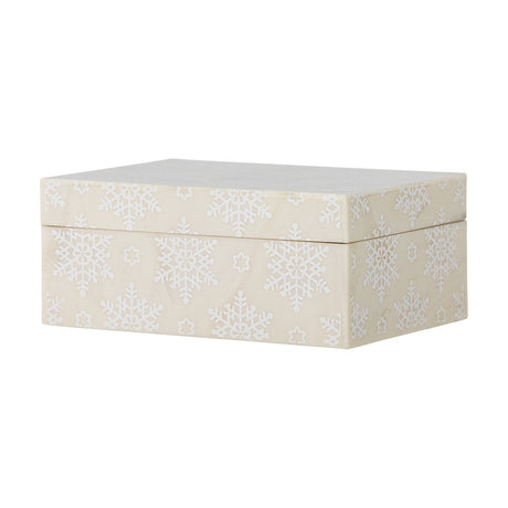 Cheri rectangular Christmas storage box with lift-off lid in cream resin, patterned with pale snowflakes and stars on all sides, shown on a plain white background.