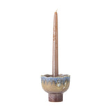 Cloe Stoneware Candle Holder 9cm in multicoloured glaze with scalloped rim, rounded body and short pedestal foot, holding a tall taper candle on a white background.