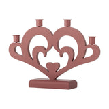 Red MDF heart-shaped Advent candle holder with scroll details and a small centre heart, featuring four arched candle cups on a rectangular base.