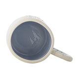 Cloudy Floral Stoneware Cup 225ml in cream, shown top-down revealing a blue-grey glazed interior and striped ring handle, on a plain white background.