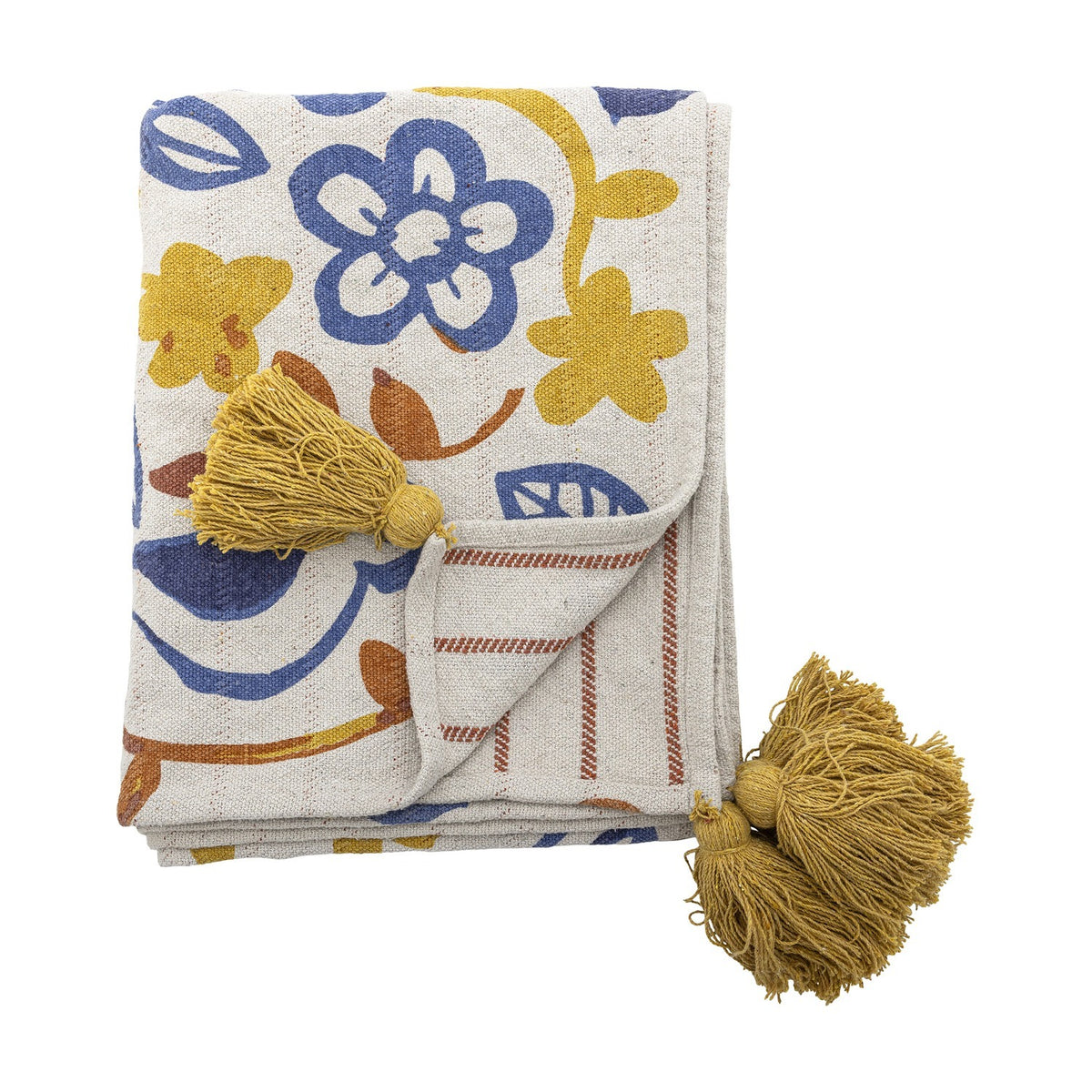 Figuria Cotton Throw folded flat with a multicoloured floral, leaf and bird print in blue, mustard and rust tones, finished with mustard corner tassels, shown on a white background.