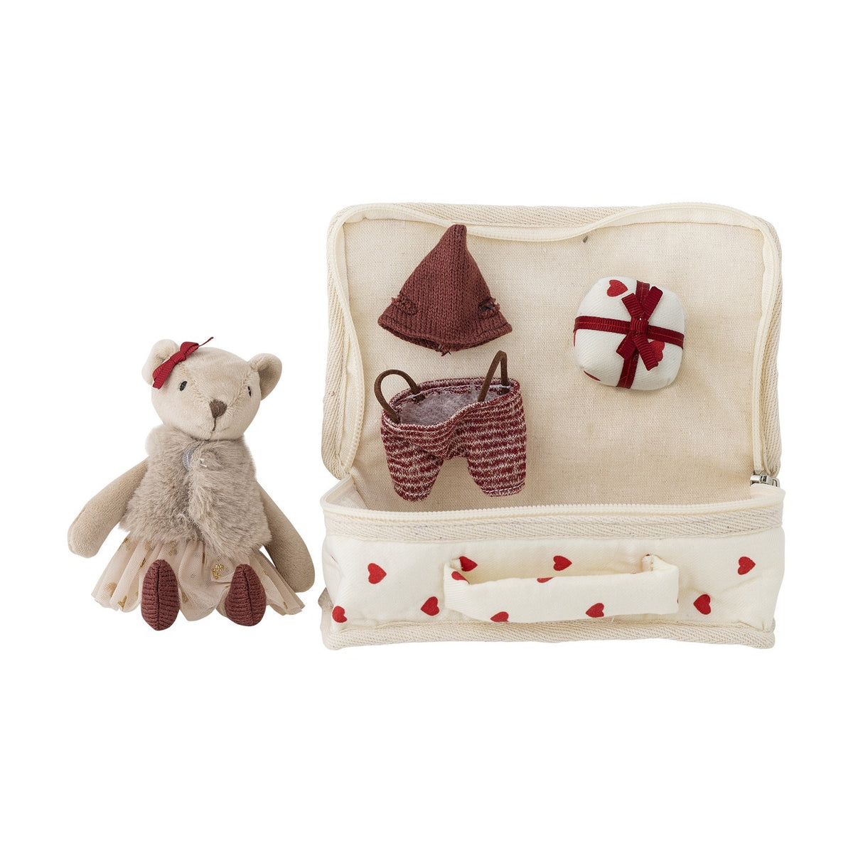 Lara cotton rag doll shaped like a bear, wearing a bow, fluffy waistcoat and sheer heart-print skirt, beside an open heart-patterned suitcase with a knitted hat, striped shorts and a small ball.