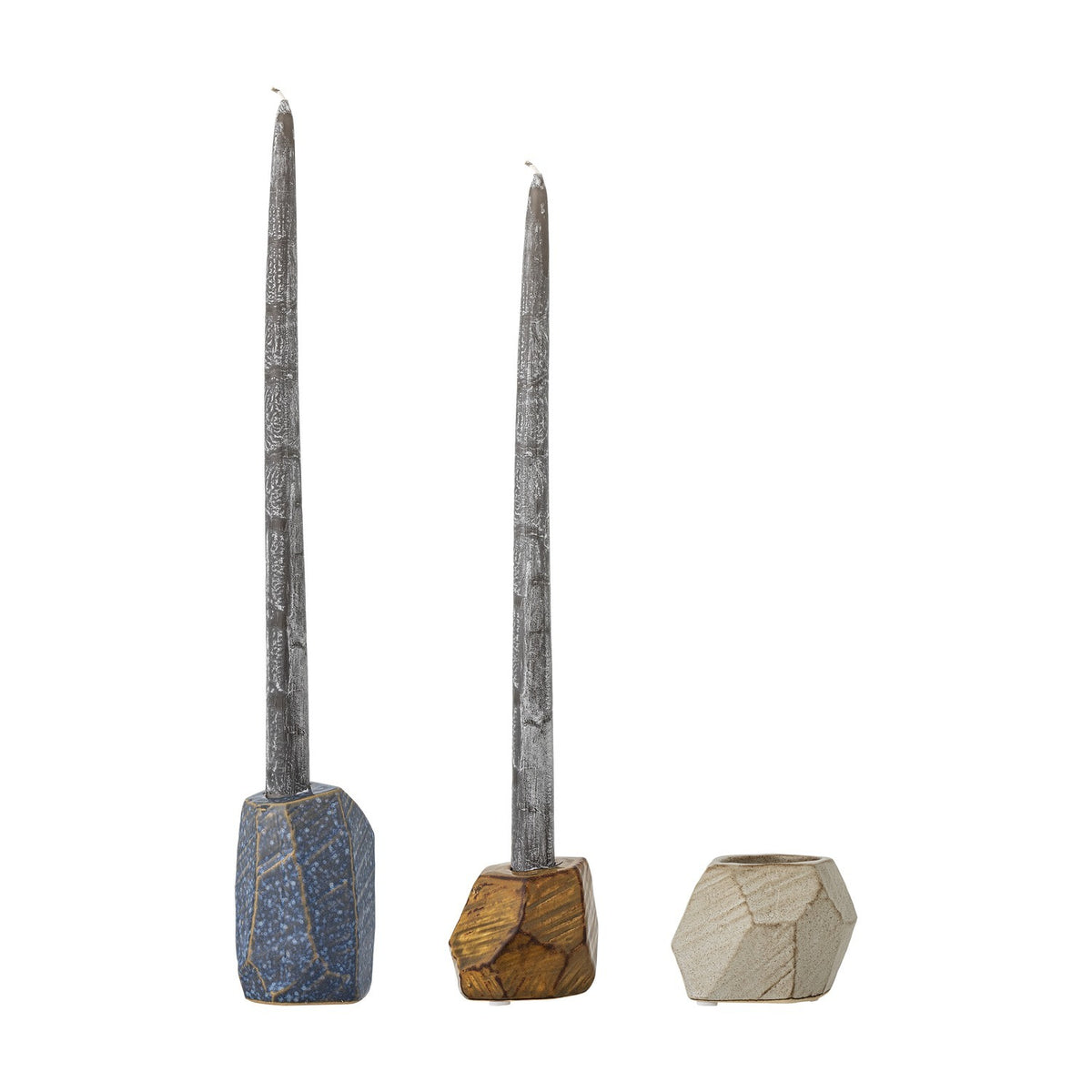 Kimber Stoneware Tealight & Candle Holders, set of 3 faceted ceramic holders in blue, mustard and cream glazes with tall grey candles, on a white background.