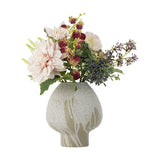 Splendor Artificial Bouquet in Pink, featuring a large many-petalled bloom with berries, foliage and buds in a speckled stoneware vase on a white background.