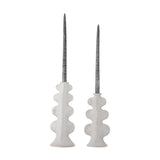 Cason stoneware candle holders, set of 2 in white, with rounded lobed columns, sunburst motifs, and flared feet in varying heights, shown with tapered candles on a plain background.