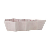 Shirly stoneware Christmas platter in pink, tree-shaped with wavy tiered edges and fine hand-painted stripes along the rim, shown against a plain white background.