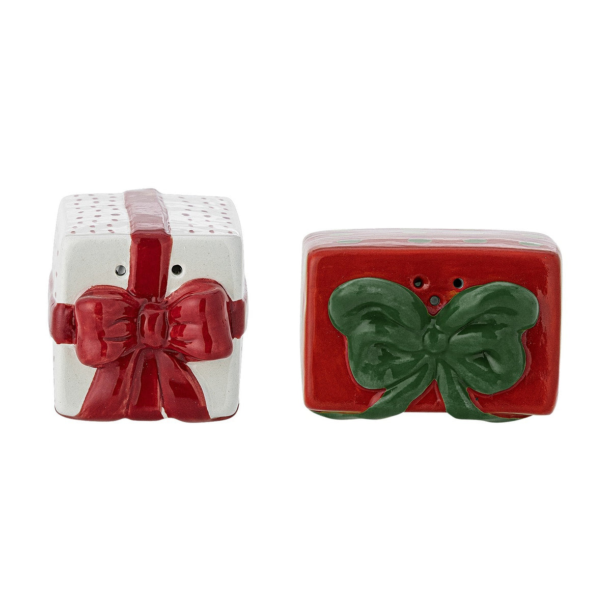 Ceramic Christmas salt and pepper shaker set styled as gift-wrapped boxes, one white with a red bow, one red with a green bow, on a plain white background.