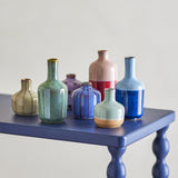 Maien Striped Stoneware Vases, set of 7 small ceramic bottle and rounded vases in green, blue, pink, cream and purple glazes with stripes, dots and two-tone bands.