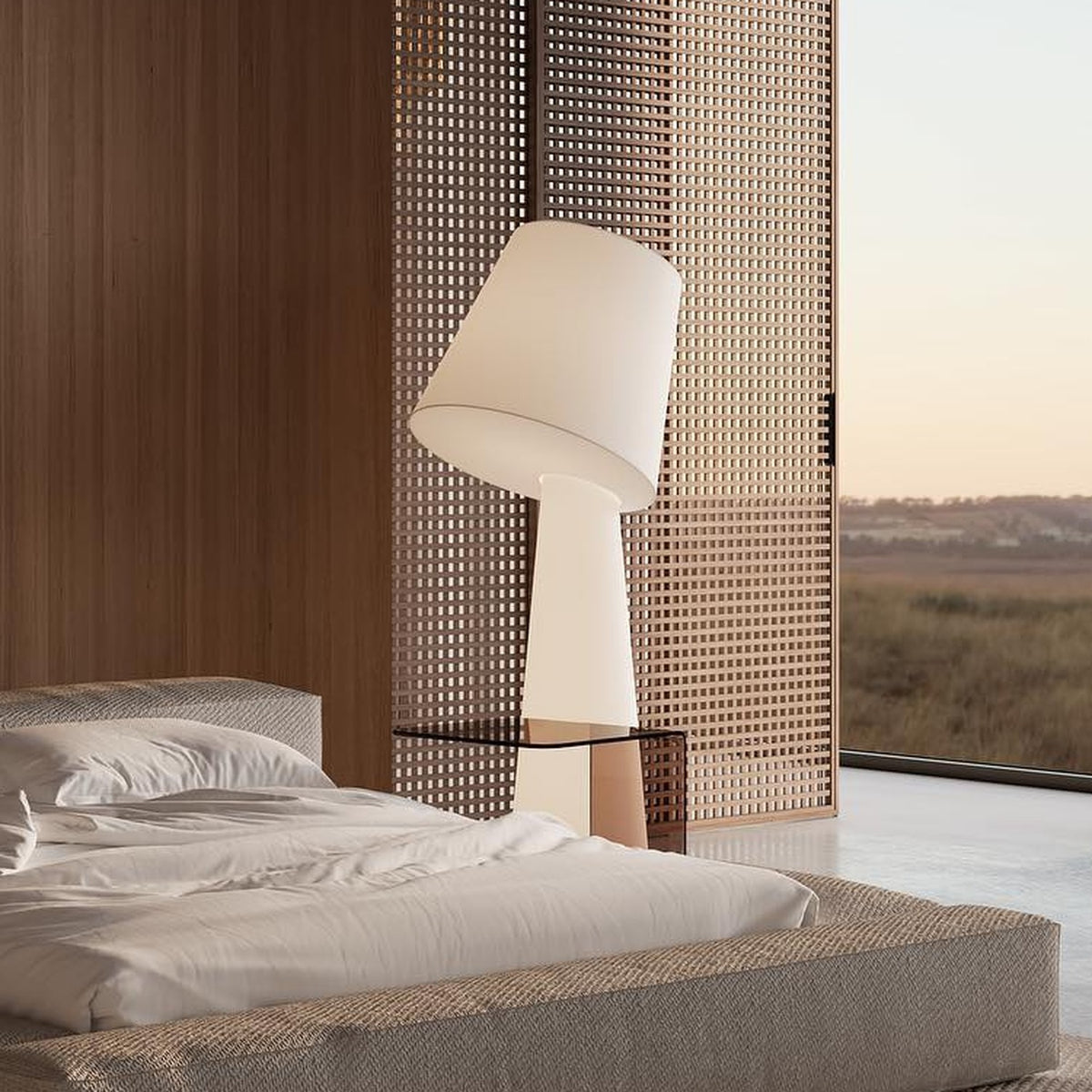 Big Brother 3 Light Fabric Floor Lamp in white, tall tapering base with tilted drum shade, shown bedside in a modern room with woven screen and glass shelf accent.