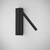 Arid A/03 Aluminium LED wall light in Textured Black, with a ribbed vertical back plate and a single angled tubular arm, shown on a plain light grey background.