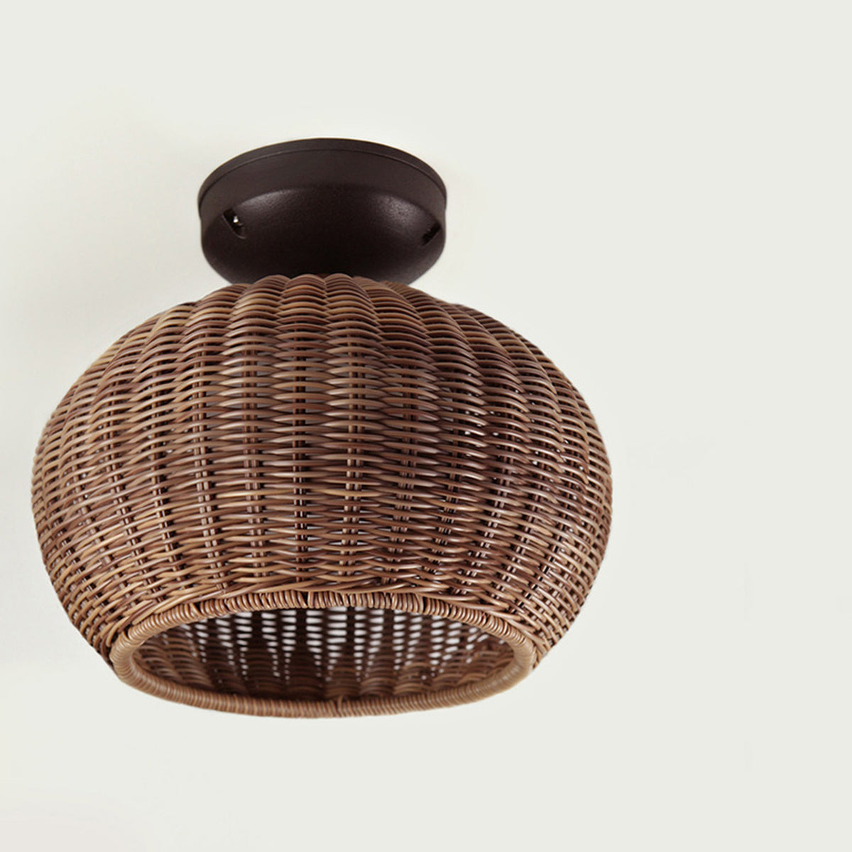 Garota PF/01 semi-flush outdoor ceiling light with a round globe shade in brown woven synthetic fibre and dark mounting canopy, shown against a plain light background.