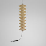 Yuyun S/9L/I fabric LED pendant light with nine stacked woven beige cotton tiers on a slender stem, satin beige finish, shown against a plain light grey background.