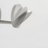 Bella Direct Aluminium LED wall light with round back plate, slim angled arm and flat disc head in brushed silver, shown against a plain white background.