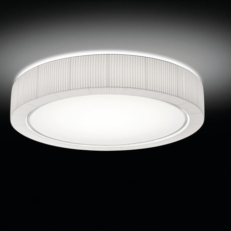 Urban PF/90 Ribbon LED ceiling light with a round drum shade in pleated white translucent fabric over an iron frame, broad white diffuser with silver trim, shown glowing against a dark background.