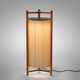 Kando P/111 Ribbon LED floor lamp with a tall pleated cream shade inside an open teak wood frame and dark top disc, on a plain light background.