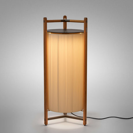 Kando P/111 Ribbon LED floor lamp with a tall pleated cream shade inside an open teak wood frame and dark top disc, on a plain light background.