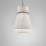 Folie S/70.2 tiered pendant light with white pleated ribbon shade, cylindrical top and flared cone tiers joined by a black ring, shown on a plain grey background.