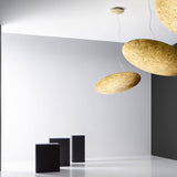 Gong Aluminium Disc LED Pendant Light 60cm in gold leaf finish, shown as flat round discs suspended on thin wires at different heights in a white interior setting.