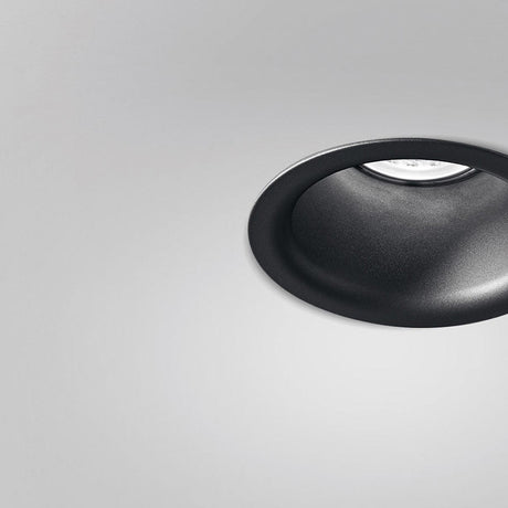 Joe Aluminium Round Recessed LED Downlight 9cm in black, shown close-up with deep flared trim and recessed bulb, against a plain light grey background.