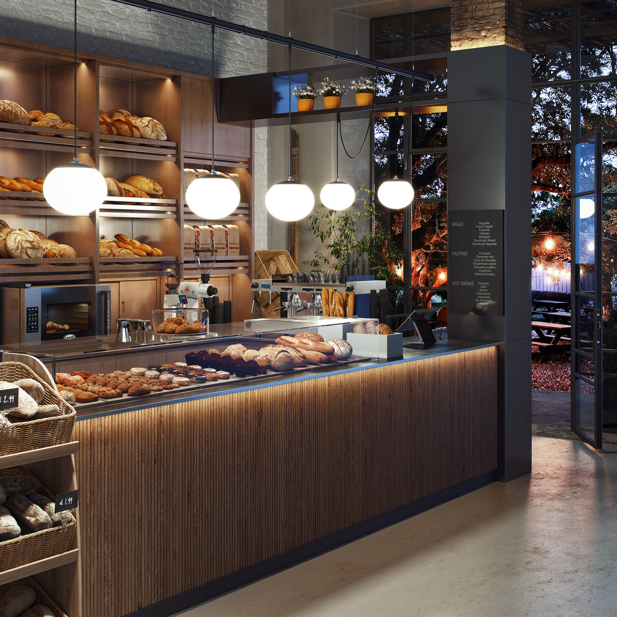Elipse Outrack white globe LED track pendant lights illuminating a bakery counter display, shown with multiple globes suspended above the serving area.