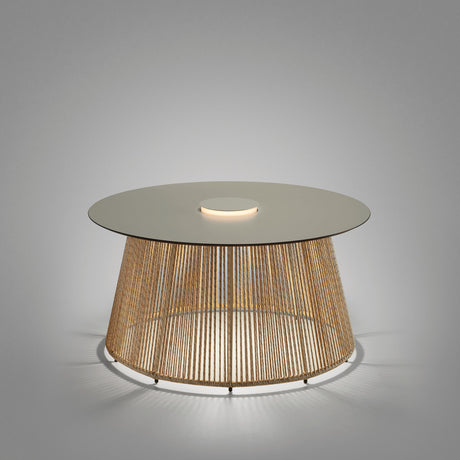 Nit/80/R Woven Rechargeable Outdoor Table Lamp in ivory and beige, round tabletop with central integrated LED light ring on a woven cord drum base, shown on a plain grey background.