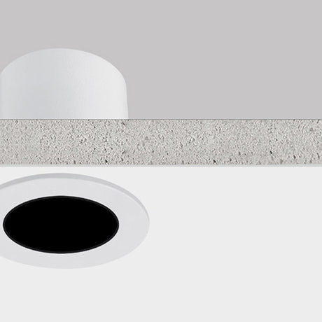 Nick Aluminium Round Recessed LED Downlight 5cm in white, shown in cross-section with ceiling plaster, round white trim, black interior, and integrated LED, warm white 3000K.