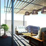 Ralph Woven Plug-in Outdoor Pendant Light, 35cm metallic brown basketwork shade, shown with matching pendants over a pergola-covered outdoor seating area.