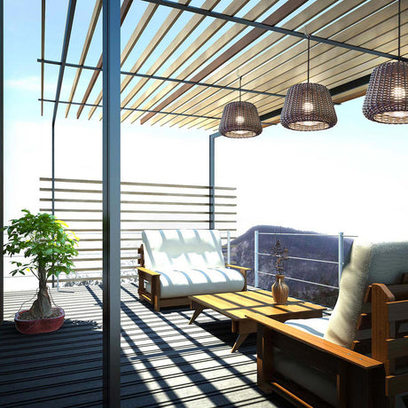 Ralph Woven Plug-in Outdoor Pendant Light, 35cm metallic brown basketwork shade, shown with matching pendants over a pergola-covered outdoor seating area.