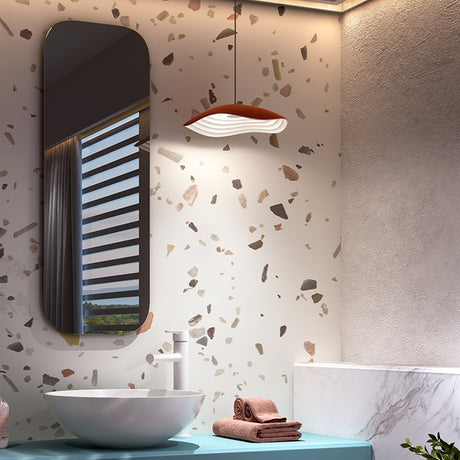 Valentina S/24 LED pendant light with a wavy, tiered aluminium shade in terracotta and white, shown suspended above a bathroom vanity.