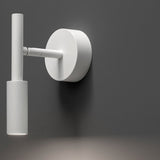 Tubino Aluminium LED Wall Light in white, a slim tube fixture on an adjustable arm from a round wall plate, shown against a dark grey background.