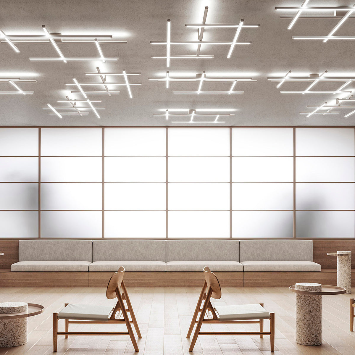Hilow LED ceiling light with brushed titanium bars and black diffuser frames arranged in a crossing grid, installed above a lounge seating area.