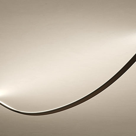 Bow Wall 300 lighting accessory in Matt Black, a slim curved line fixture with two fixing boxes, shown close-up against a plain light background.