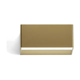 Toy S LED Wall Light, a compact rectangular wall fixture in brushed brass with a slim illuminated strip along its lower edge, shown on a plain white background.